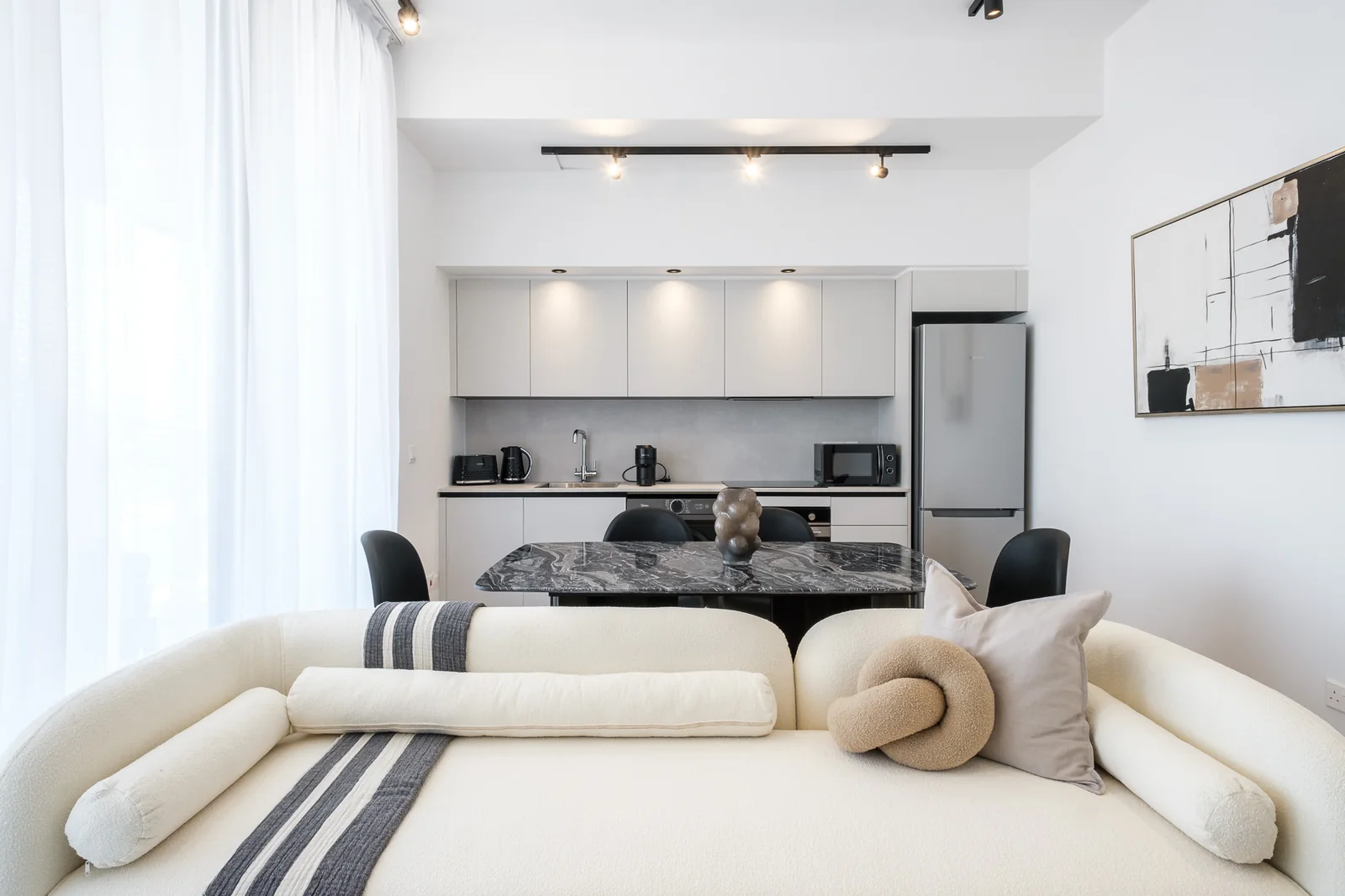 A completed Molivin living and dining space in a Limassol apartment