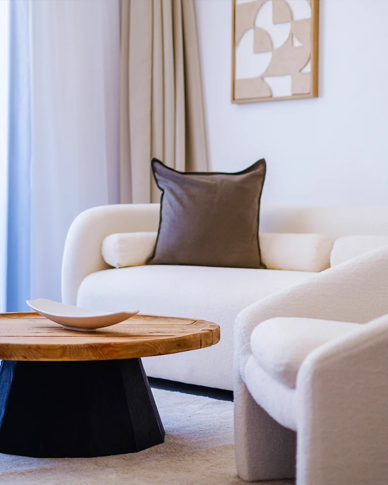 Molivin-furnished living room with cream seating and an oak coffee table